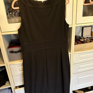 Slimming little black dress with gold details